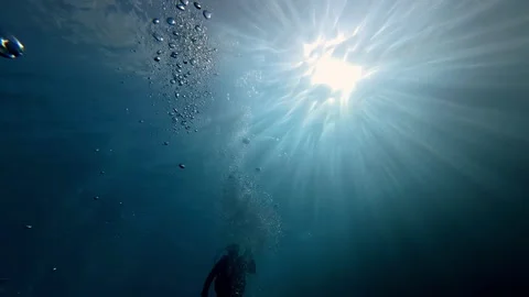 Underwater Sun Rays and Bubbles in Crystal Clear Turquoise Mediterranean Sea Video stock 329622270