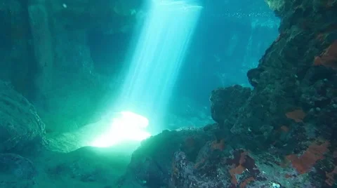 Underwater sunrays in a cave Stock Footage 44655869