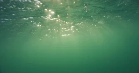 Underwater Surface With Rays of Light. Stock Footage 76261054