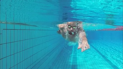 Underwater swimmer cinemagraph Stock Footage