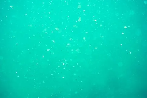 Underwater turquoise texture in ocean. Bubbles in tropical sea. Foto stock