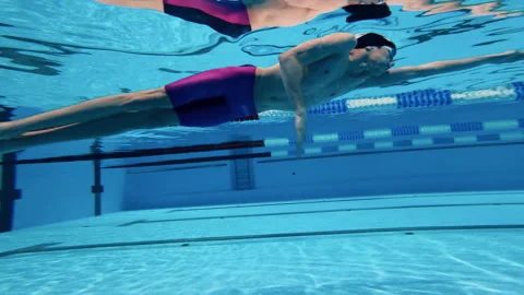 Underwater view of an athlete swimming | Stock Video | Pond5