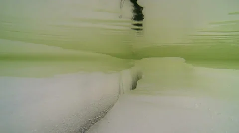 Underwater view of a crack in ice Stock Footage 37148596