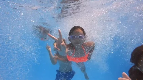 Underwater view of having fun children j... | Stock Video | Pond5