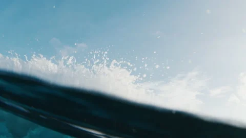 Underwater view of the ocean wave breaking on the shore in the Maldives at Stock Footage 220105670
