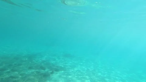 Underwater view rising to Mediterranean beach surface Stock Footage 343227848
