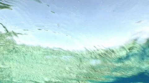 Underwater view of suface, rises to surface Stock Footage 34280346
