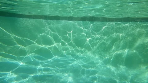 Underwater view of sun light in the pool Stock Footage 134996384