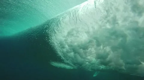 Underwater view of surfer trying to dive under wave Stock Footage 49841102