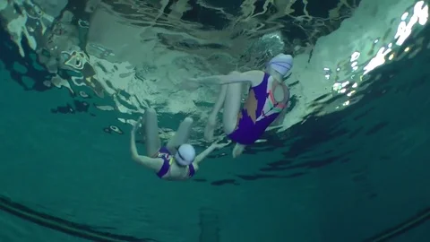 Underwater view of Synchronized Swimming. Stock Footage 72420952