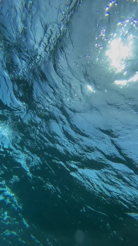 Underwater view of transparent sea wave.Vertical video Stock Footage 311004425