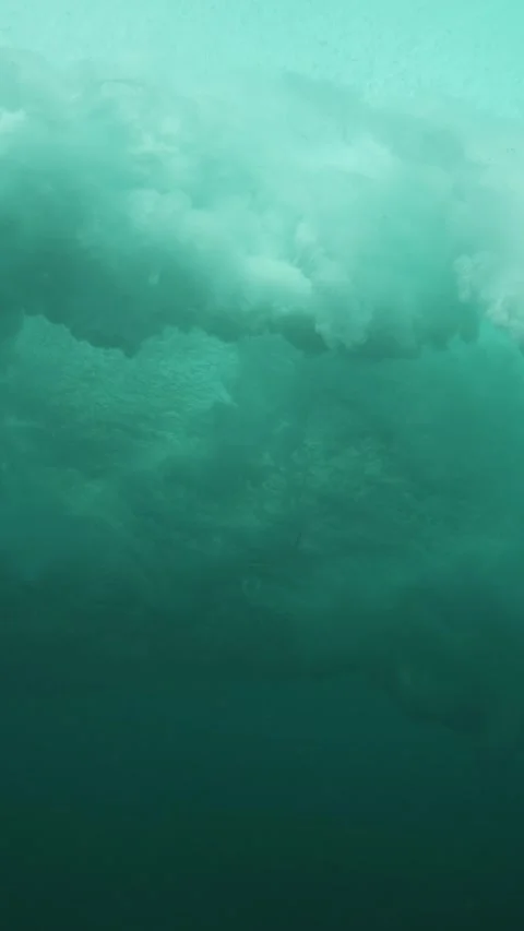 Underwater View of Turbulent Surf Waves Creating Dynamic Patterns Stock Footage 335197700