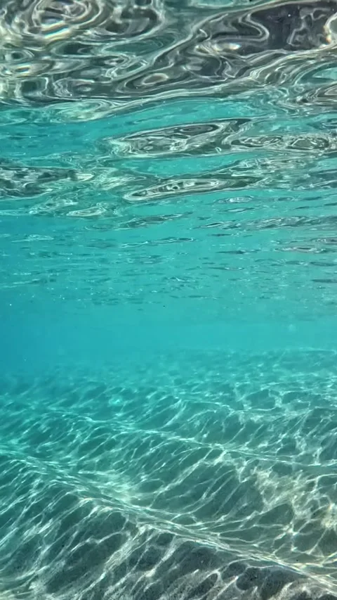 An underwater view of wave patterns and reflections. Stock Footage 311027594