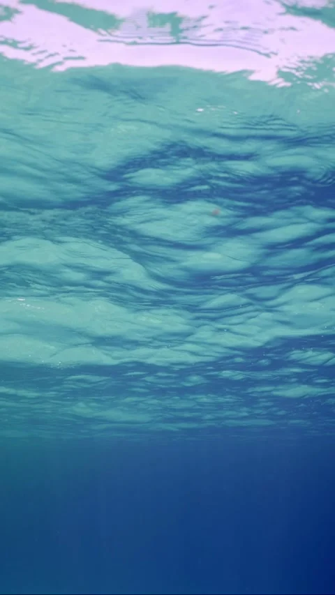 Underwater view of waves blue water surface, Slow motion, underwater shot Stock Footage 252015673