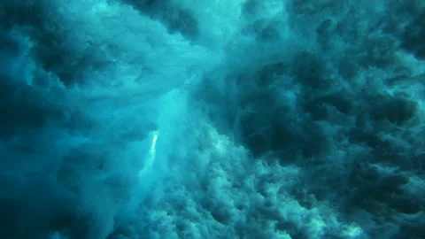 Underwater view of young man surfing in South Male Atoll Stock Footage 243793169