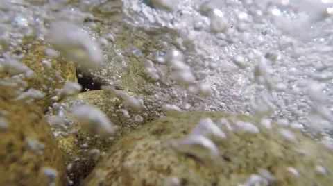 Underwater views of fast rushing bubbly water Stock Footage 41453546