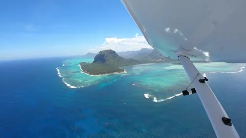 Underwater waterfall illusion view from the plane on the island of Mauritius Stock Footage 318969242