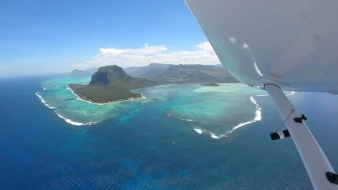 Underwater waterfall illusion view from the plane on the island of Mauritius Stock Footage 318969250