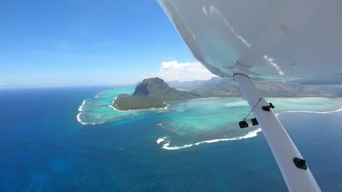 Underwater waterfall illusion view from the plane on the island of Mauritius Stock Footage 318969251