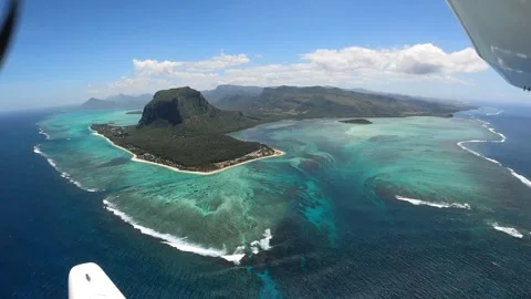 Underwater waterfall illusion view from the plane on the island of Mauritius Stock Footage 318969256