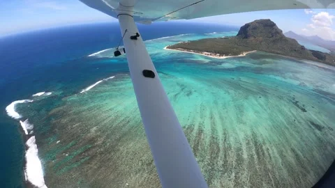 Underwater waterfall illusion view from the plane on the island of Mauritius Stock Footage 318969414
