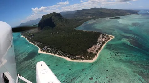 Underwater waterfall illusion view from the plane on the island of Mauritius Stock Footage 318969416