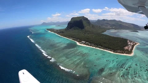 Underwater waterfall illusion view from the plane on the island of Mauritius Stock Footage 318969446