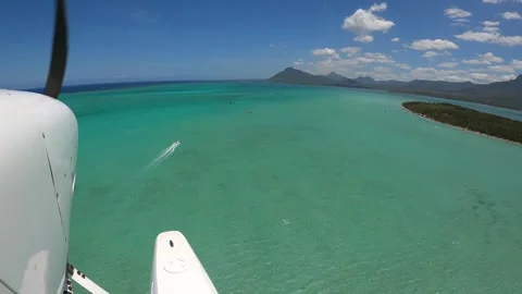 Underwater waterfall illusion view from the plane on the island of Mauritius Stock Footage 318969640