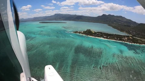 Underwater waterfall illusion view from the plane on the island of Mauritius Stock Footage 318969651