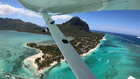 Underwater waterfall illusion view from the plane on the island of Mauritius Stock Footage 318969652