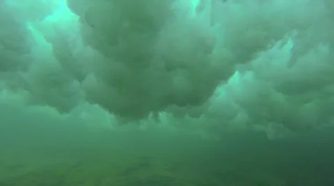 UNDERWATER: Wave breaking over the camera in crystal clear water Stock Footage 37694676