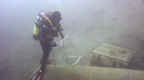 Underwater zimmer frame fun - comedy Stock Footage 48587536