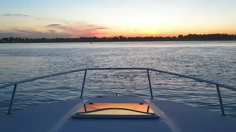 Underway Boat Bow Reflection at Sunset 스톡 동영상 12363300