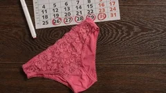 Woman Applying Maxi Pad To Underwear, Stock Video