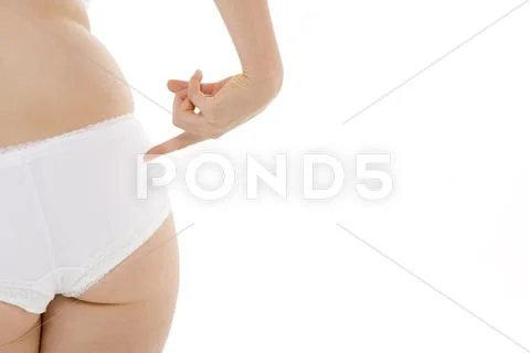 Underwear clad midsection of a female Stock Photos