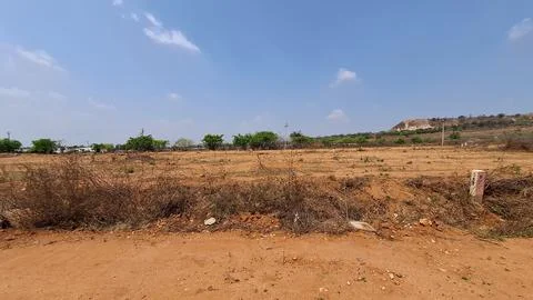 Undeveloped Real Estate Plot Layout and Rugged Terrain in India Stockfoto's
