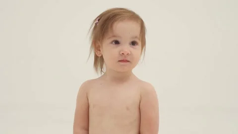 Undressed happy little girl clousup | Stock Video