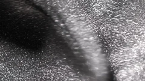 Undulating close-up of silver titanium paint forming deep elegant folds and Stock Footage 327604787