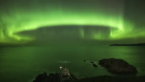 Undulating Northern Lights on the coast Stock Footage 269707061