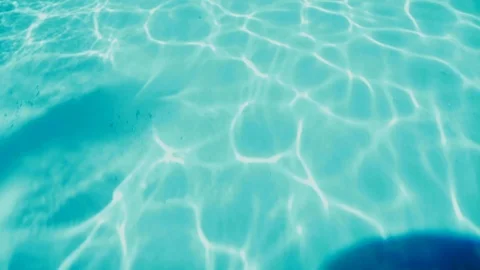 Undulating Ripples on Blue Water Pattern at bottom of Shark Tank Stock Footage 107436812