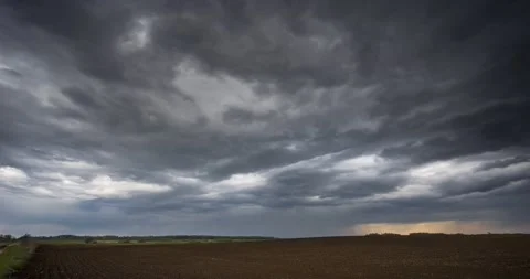 Undulating storm clouds moving across the sky Stock Footage 240070391