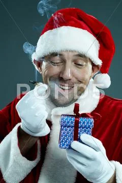 Unequal Santa Stock Photos