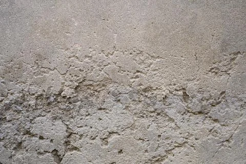 Uneven Beige Wall Texture: Rough Plaster Background for Design Projects Stock Photos