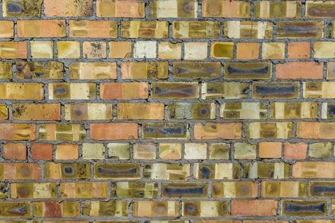 Uneven Brick Wall with Manufacturing Defects Photos
