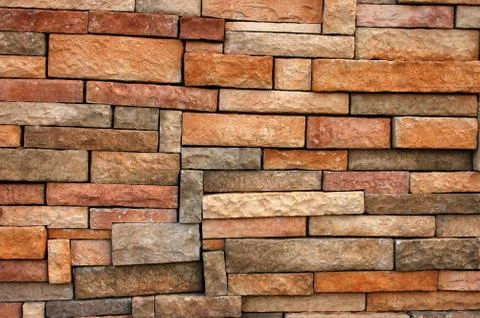 Uneven brick wall Fotos Stock