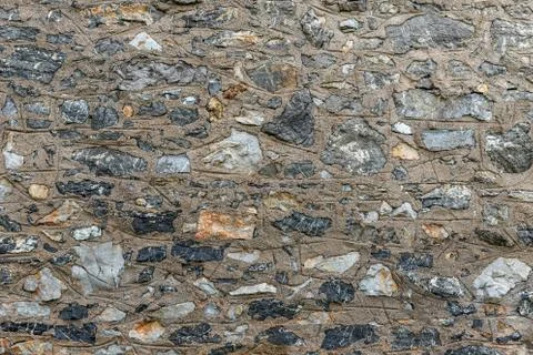 Uneven stone wall Stock Photos