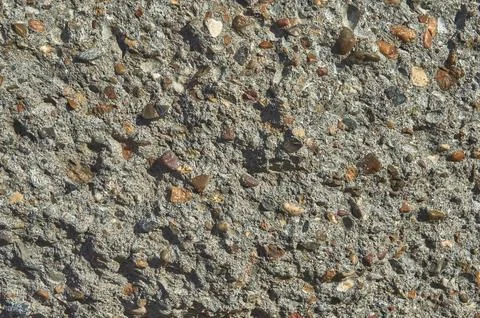 The uneven surface of a concrete block as a background Stock Photos