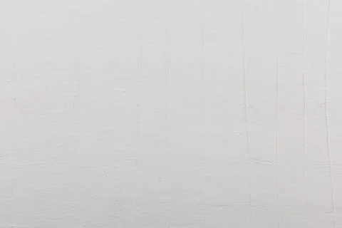 Unevenly applied white putty with cracks and spatula marks Photos