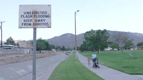 Unexpected Flash Flooding Keep Away from Arroyos Sign Stock Footage 131599256