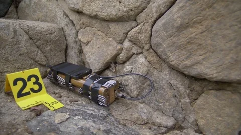 UNEXPLODED BOMB AT A CRIME SCENE. Stock Footage 76408645